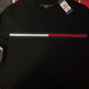 Am selling 5 shirts 1 jean, 1 sweat pant and a wallet